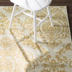 Charlton Home Carriage Hill Ivory/Gold Indoor/Outdoor Area Rug CHLH2955