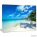 DesignArt Tropical Beach with Palm Shadows Large Seashore Photographic Print on Wrapped Canvas ESIG9361